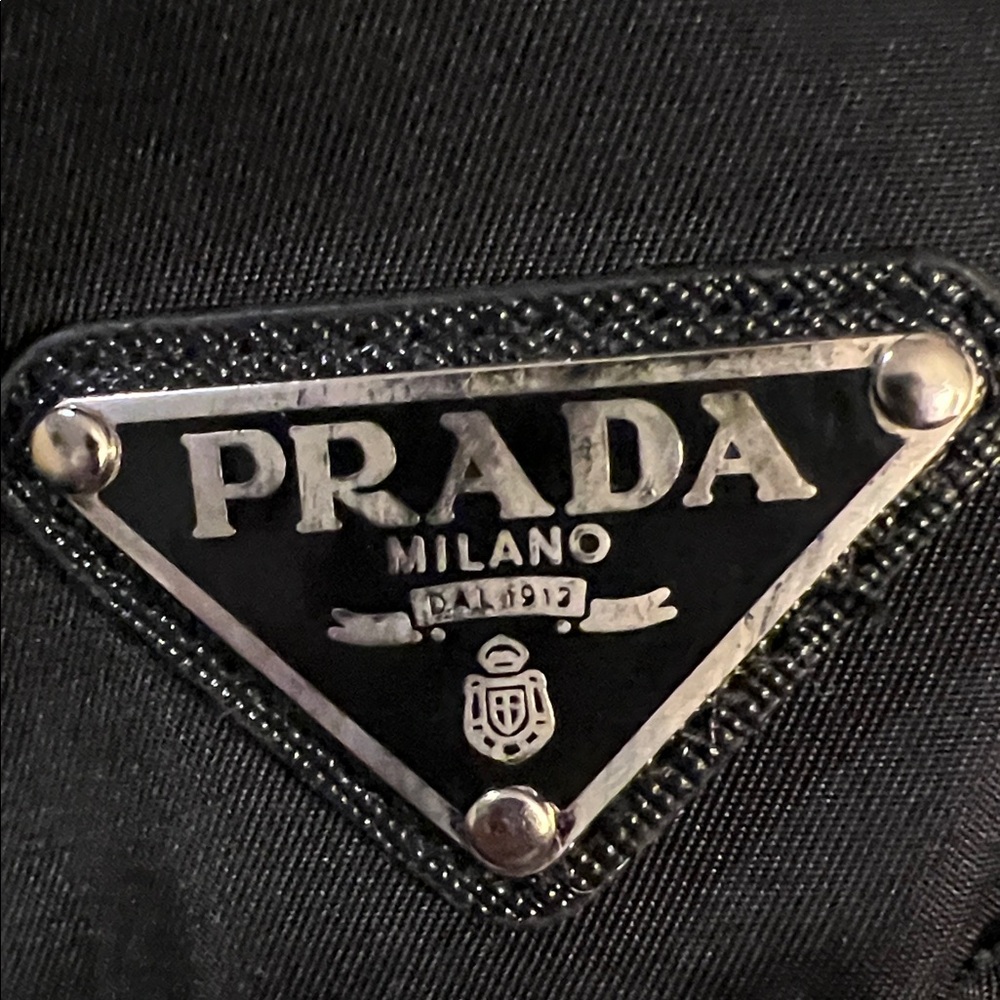 Prada Black and Silver Triangle Logo Plaque